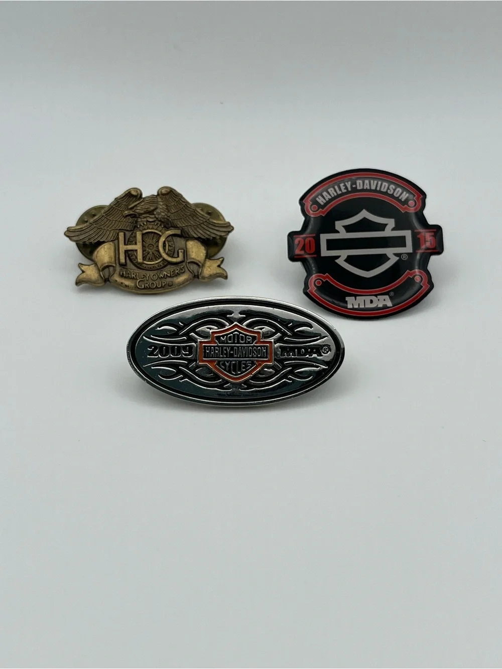 Harley-Davidson Collectible Pin Trio – Black, Red, Gold